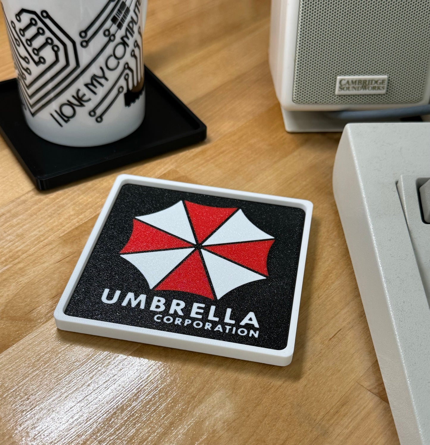 Resident Evil > UMBRELLA CORPORATION < Drink Coaster - Black w White Border