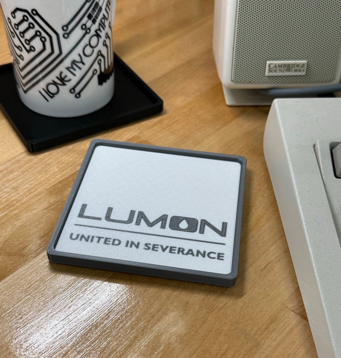 Severance > Lumon: UNITED IN SEVERANCE < Drink Coaster - White/Grey w Grey Border