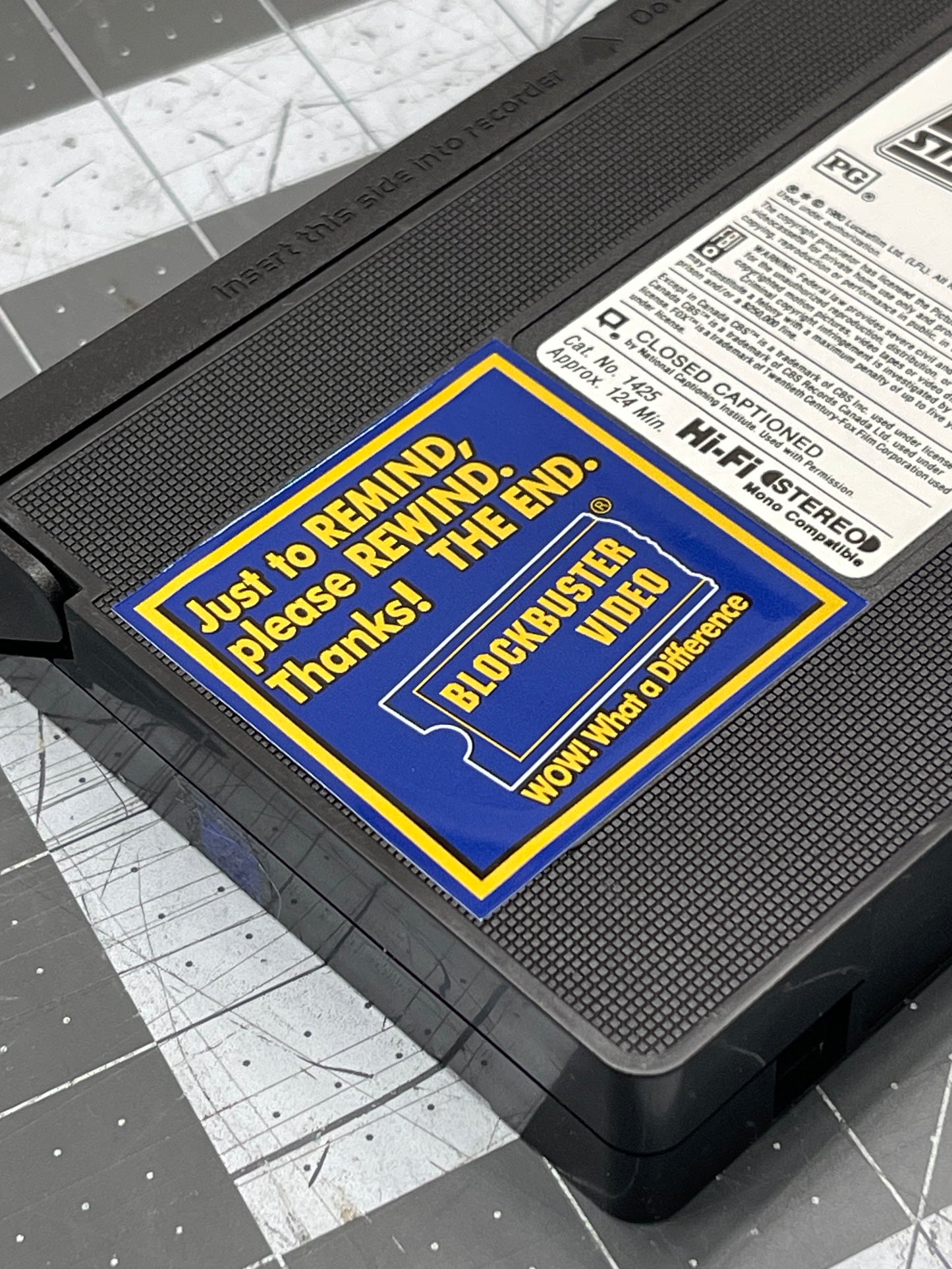 Blockbuster Video “Just to Remind, Please Rewind” VHS Sticker