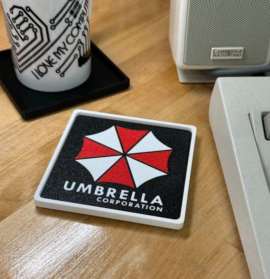 Resident Evil > UMBRELLA CORPORATION < Drink Coaster - Black w White Border
