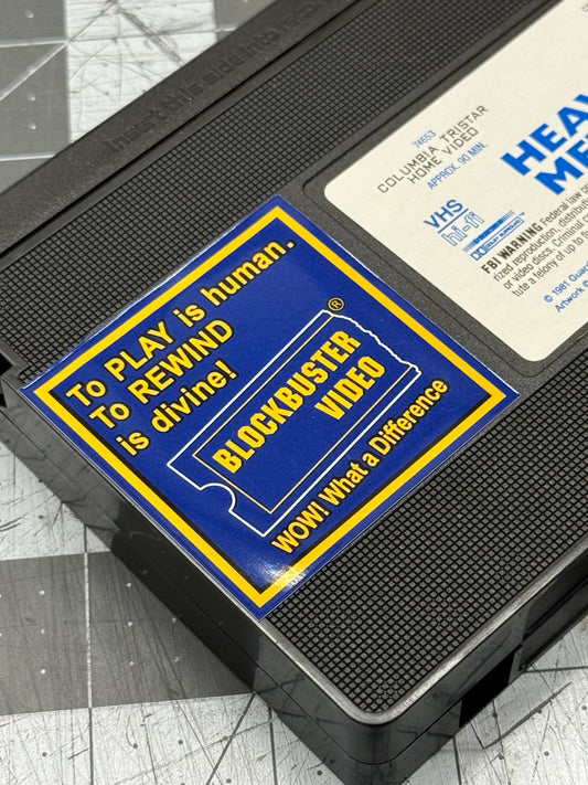 Blockbuster Video “To Play is Human, to Rewind is divine!” VHS Sticker