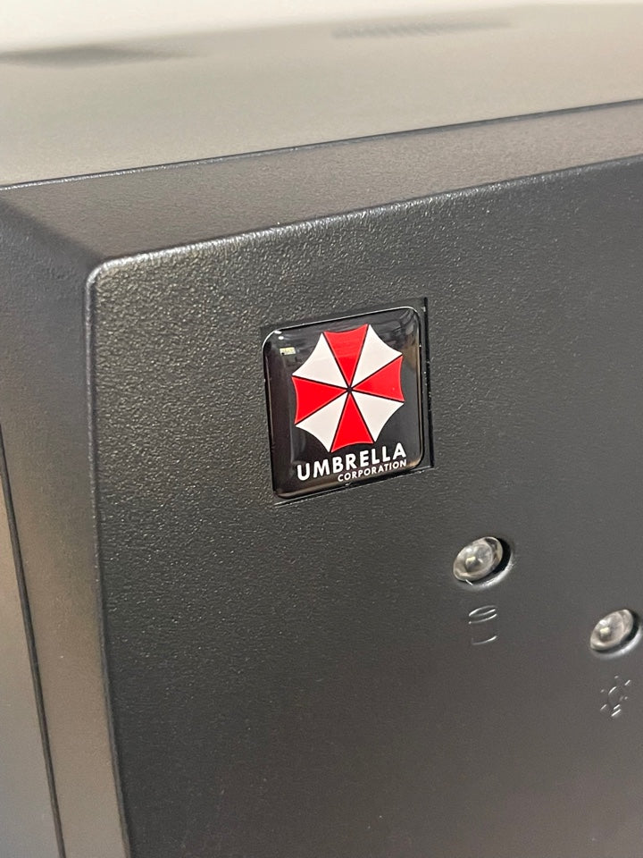 > Umbrella Corporation < Resident Evil Case Badge Sticker - Dome Black